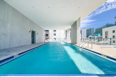 a swimming pool on the roof of a building at Private Terrace in Luxury 3BR Condo in Brickell in Miami