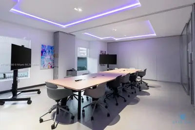 a large conference room with a long table and chairs at Best Stay Gym Bar and Spa in Miami