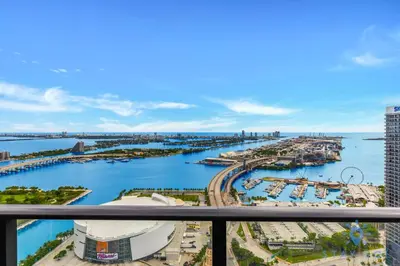 a view of a harbor from a balcony at Luxury Apartment 3 Bedrooms Pool Gym Views & More in Miami