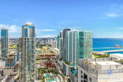 an aerial view of a city with tall buildings at Chic Downtown - City Views Gym & Pool in Miami