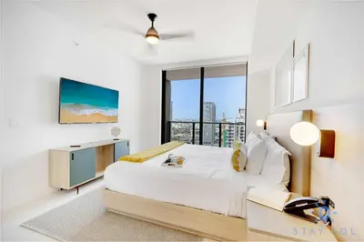 a bedroom with a large bed and a large window at Oasis Apartment 1 Bedroom with Pool & Gym in Miami