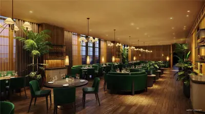 a restaurant with green tables and chairs and plants at Oasis Apartment 1 Bedroom with Pool & Gym in Miami