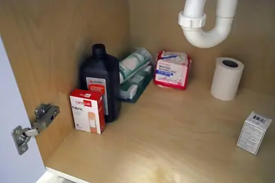a close up of a door with toilet paper and a bottle at Family Pet Friendly Apartment 3 Minute Walk to Miami Beach in Miami Beach