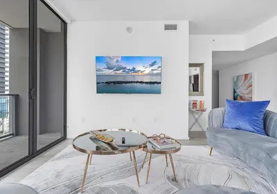 a living room with a couch and a table at X Lounge II-Highline Corner Residence in Miami