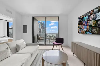 a living room with a couch and a table at Free Parking! Luxury Condo in Downtown Miami in Miami