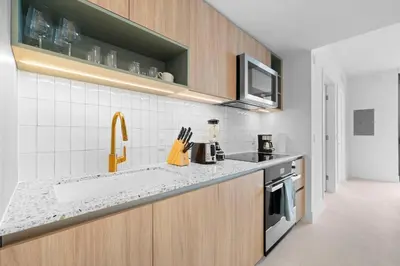 a kitchen with a sink and a microwave at Free Parking! Luxury Condo in Downtown Miami in Miami