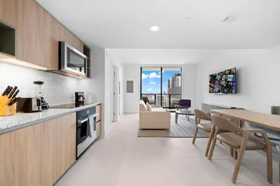 a kitchen and dining room with a table and chairs at Free Parking! Luxury Condo in Downtown Miami in Miami