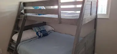 a bunk bed in a room with a bunk bed in a bedroom at Holliday 3-bedroom Private duplex House Parking WiFi BBQ Karaoke Available in Cutler Bay