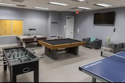 a room with a ping pong table in a room at Spacious 29th Floor 1 BED 1 BTH Brickell Ocean View in Miami