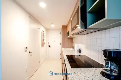 a kitchen with a sink and a counter top at Apartment in New Luxury Condo in Downtown in Miami