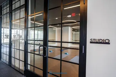 an entrance to an office with glass doors at Apartment in New Luxury Condo in Downtown in Miami