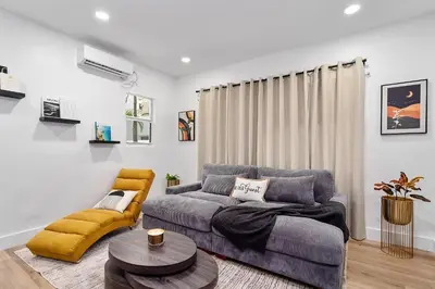 a living room with a couch and a table at Casa Roselle # 2 in Hollywood