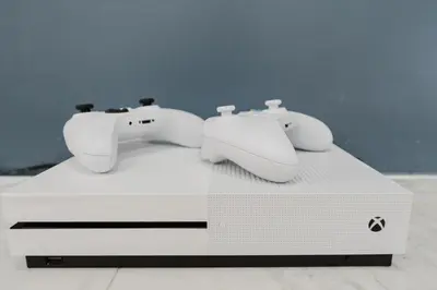 aintendo wii controllers sitting on top of a table at Beautiful Aventura Villa Sleeps 26 in Miami