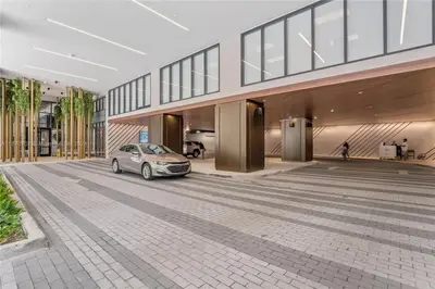 a car parked in a parking lot in a building at Panoramic Ocean View 3 bedroom Nativo Pool Gym SPA in Miami
