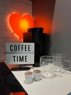 a coffee time sign sitting on a counter with cups at Ocean View Entire Condo In Downtown With Pool and Gym in Miami