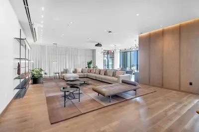 a living room with a couch and a table at Stylish City Getaway with Pool Skyline Views in Miami