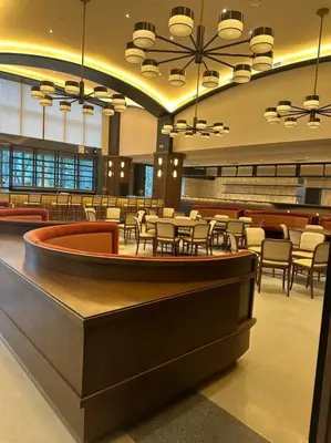 a restaurant with tables and chairs in a building at Magic Miami Penthouse Balcony, Insane Ocean & City Views Luxury,Pool,Spa,Gym in Miami