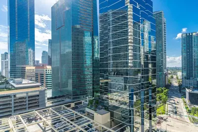 an aerial view of a city with tall skyscrapers at Magnificent Ocean Sky Residence in Miami