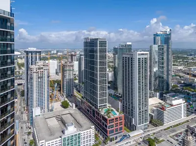 an aerial view of a city with tall buildings at Sky-High Views Pool and Fitness Center Access in Miami