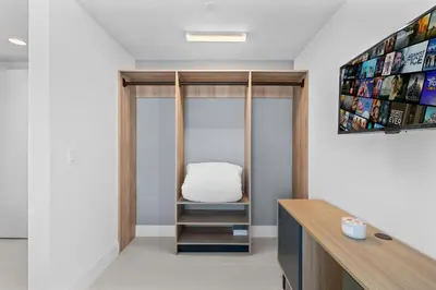 a room with a desk with a chair in it at Luxury 45th-Floor Condo with Stunning City Views in Miami