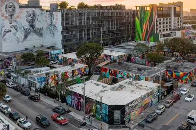 an aerial view of a city with buildings with graffiti at Wynwood Miami Family Oasis in Miami