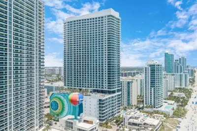 an aerial view of a city with tall buildings at On the Beach, Ocean and City Views 17 Zen at LYFE Resort in Hollywood