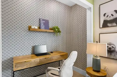 a home office with a desk and a chair at Spacious 4BR Waterfront Home with Private Pool, Tiki Hut & Free Parking near Miami & Key Largo in Cutler Bay