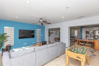 a living room with a couch and a table at Casa Bora Bora - Fun in Miami - Big Pool - Fit 12 in Miami