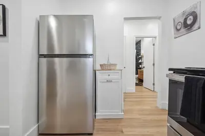 a stainless steel refrigerator in a kitchen at Casa Roselle On The Beach Full 22 in Hollywood