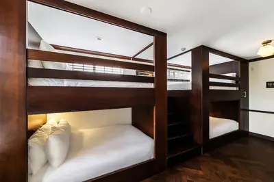 a group of bunk beds in a room at Jefferson Hotel in Miami