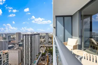 a balcony with a view of a city at Luxury Studio on 47th! Floor in Downtown Miami in Miami