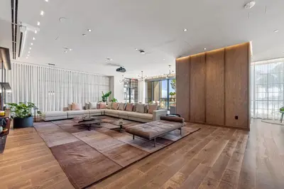 a living room with a couch and a table at Luxury Studio on 47th! Floor in Downtown Miami in Miami