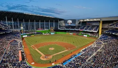 a large crowd of people in a baseball stadium at 5 Star Feel in Miami Prime Location in Miami