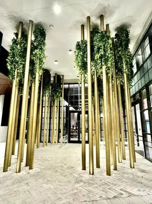 a group of bamboo poles in front of a building at 43 Floor Miami 1BD Near Arena in Miami