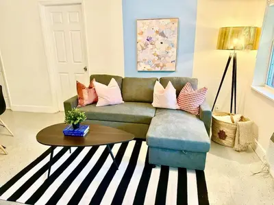 a living room with a couch and a table at New Brisa Marina in Fort Lauderdale