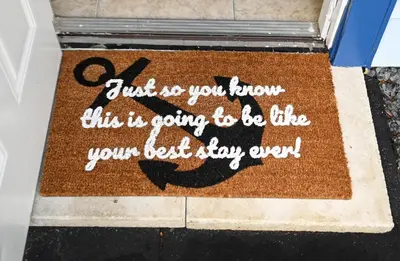 a welcome mat with a saying on it at Hidden Getaway in Fort Lauderdale