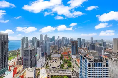 an aerial view of a city with tall buildings at Stunning Condo with Free Parking on 46th Floor! in Miami