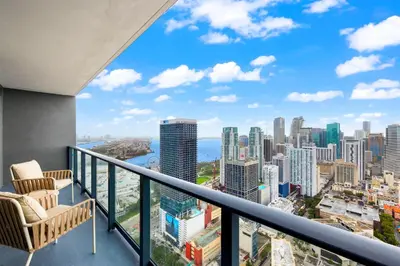 a balcony with a view of the city at Stunning Condo with Free Parking on 46th Floor! in Miami