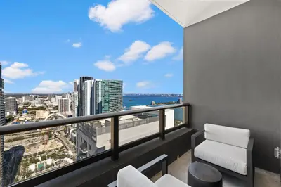 a balcony with a view of the city at 48Flr Condo w Free Parking in Miami