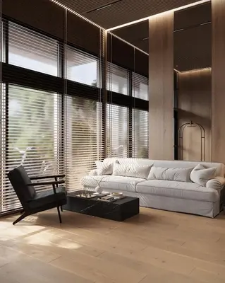 a living room with a white couch and a chair at The March Hotel in Miami Beach