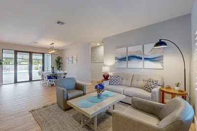 a living room with a couch and chairs and a table at Outdoor Oasis! Group-Friendly Miami Getaway in Burrs Strip