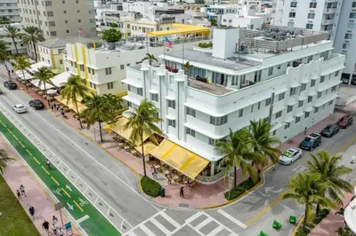 an overhead view of a city street with a white building at Luxury Large 1BR at The Carlyle SoBe Sleeps 4 in Miami Beach