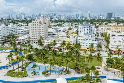 an aerial view of a city with palm trees at Luxury Large 1BR at The Carlyle SoBe Sleeps 4 in Miami Beach