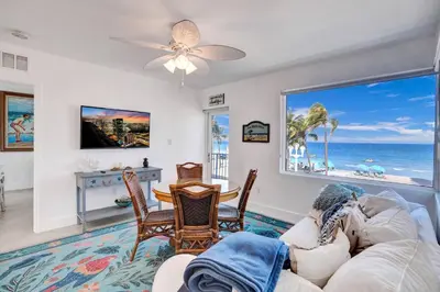 a living room with a view of the ocean at Sunset Oceanfront Paradise in Hollywood