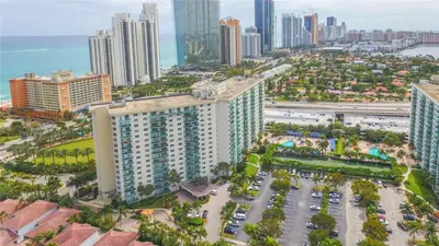 an aerial view of a city with tall buildings at Sunny Isles Beachfront Oasis, Modern & Spacious in Sunny Isles Beach