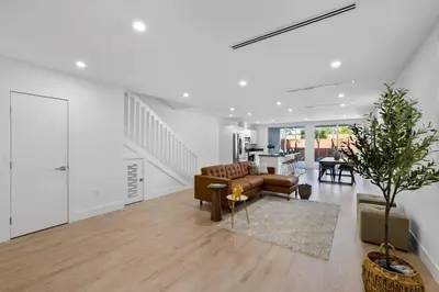 a living room with a couch and a table at Up to 12 guest Modern Villa near Wynwood! 27 in Miami