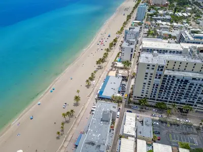 an aerial view of a beach and buildings at ULTRA peaceful 2 bedroom beach&boardwalk apartment in Hollywood