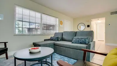 a living room with a couch and a table at Serene 1BR Haven Fort Lauderdale in Fort Lauderdale