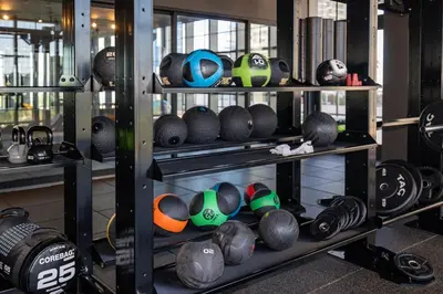 a shelf filled with lots of helmets in a gym at Wonderful 1 Bed - Amazing views in Miami