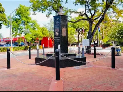 a chain fence around a monument in a park at Beds & Sheets little Havana in Miami